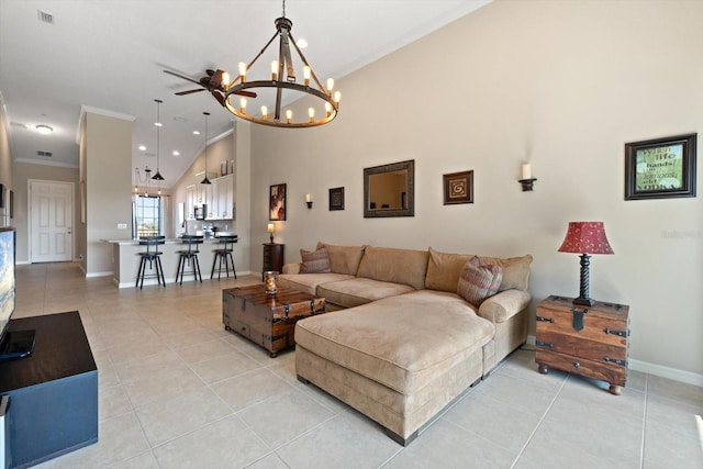 living room with ornamental molding, light tile patterned flooring, visible vents, and baseboards