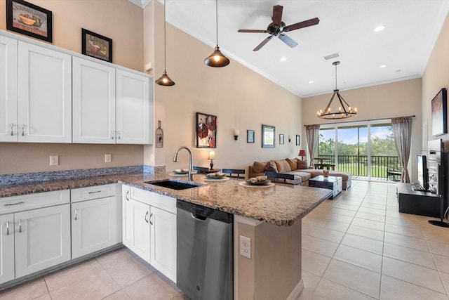 kitchen with stainless steel dishwasher, ornamental molding, open floor plan, a sink, and a peninsula