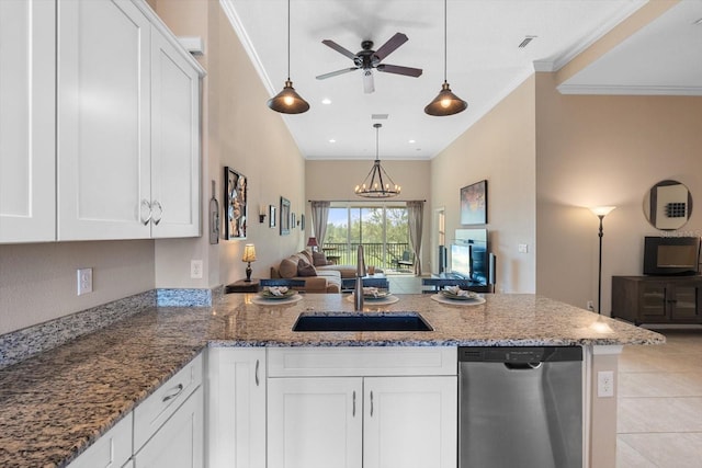 kitchen featuring light stone counters, a peninsula, open floor plan, stainless steel dishwasher, and crown molding