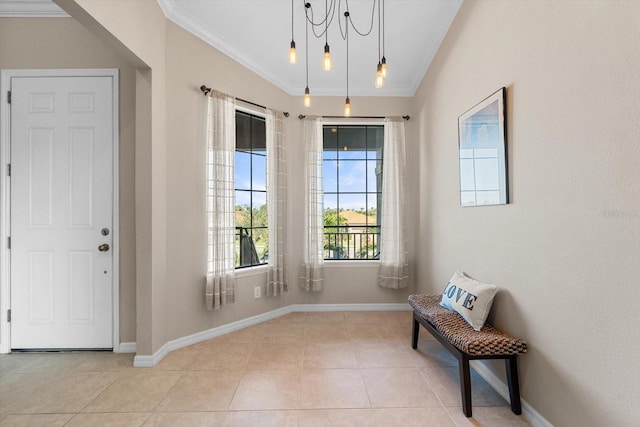 interior space featuring baseboards, tile patterned floors, and crown molding