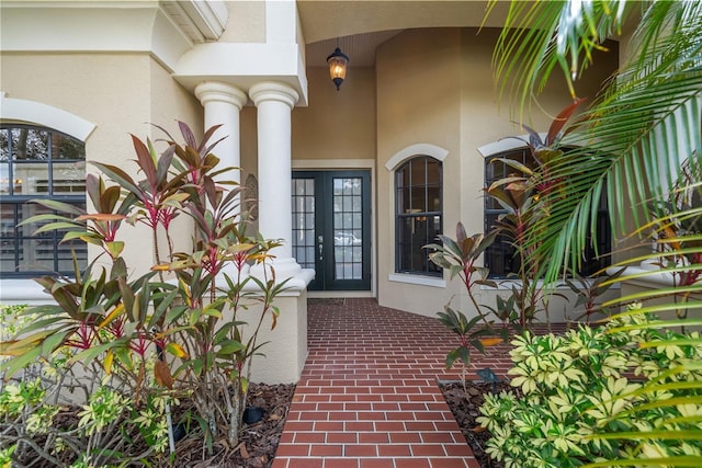 property entrance with french doors and an AC wall unit