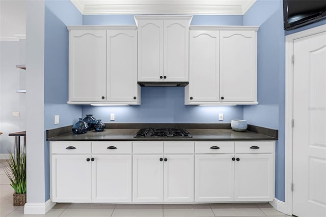 kitchen featuring white cabinetry, ornamental molding, and stainless steel gas cooktop