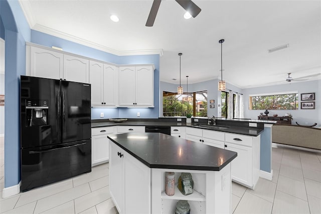 kitchen featuring black appliances, pendant lighting, a kitchen island, and white cabinets