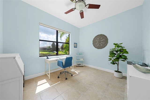 office space featuring ceiling fan and light tile patterned floors