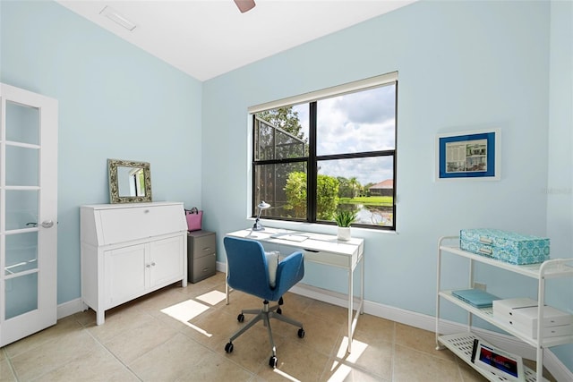 home office featuring ceiling fan and light tile patterned floors