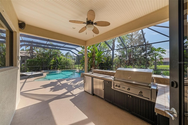 view of patio / terrace with ceiling fan, exterior kitchen, a lanai, area for grilling, and an in ground hot tub