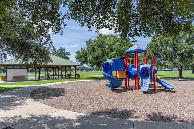 view of playground with a yard