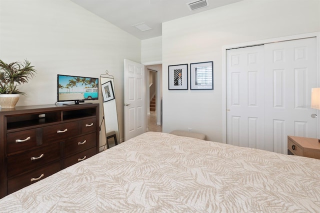 bedroom with carpet flooring and a closet