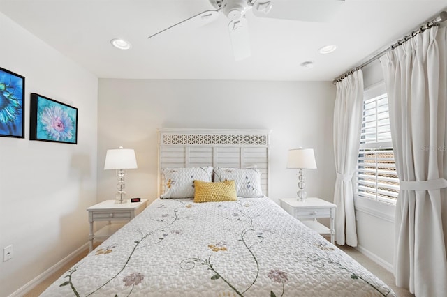 carpeted bedroom with ceiling fan