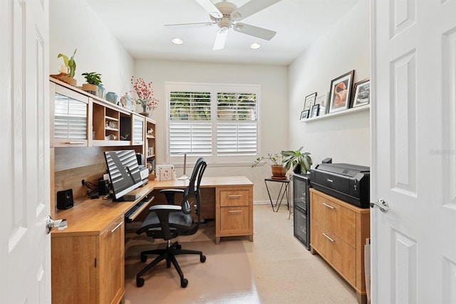 office space with ceiling fan