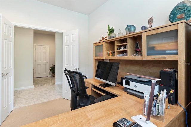 office space with tile patterned flooring