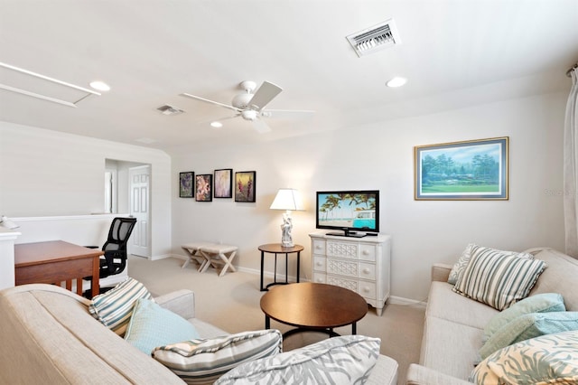 carpeted living room featuring ceiling fan