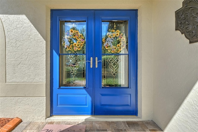 property entrance with french doors