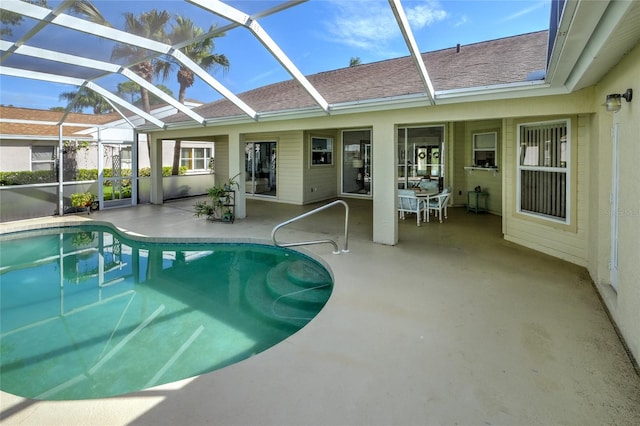 view of pool featuring a lanai and a patio area