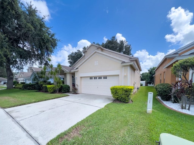 view of home's exterior with a yard and a garage