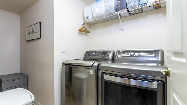 washroom with washer and clothes dryer