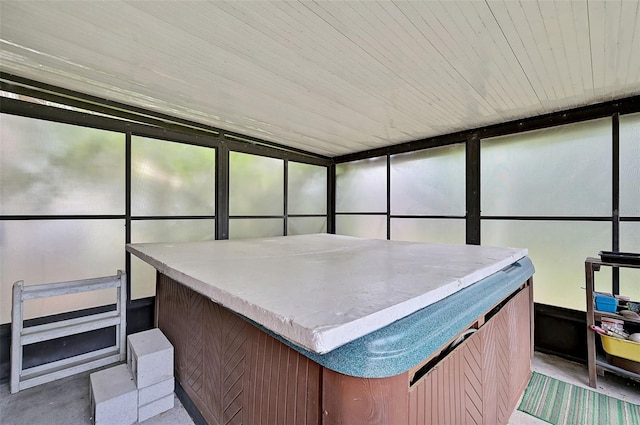 sunroom featuring indoor bar