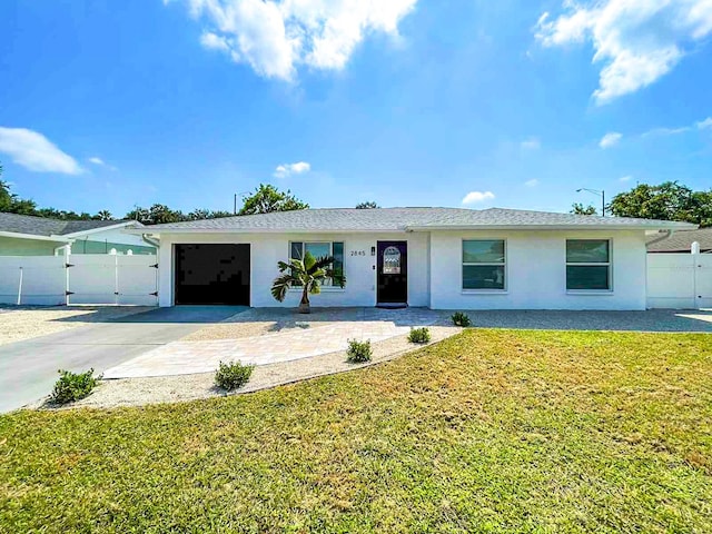 ranch-style home with a front yard