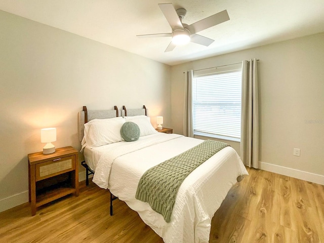 bedroom featuring ceiling fan and light wood-type flooring