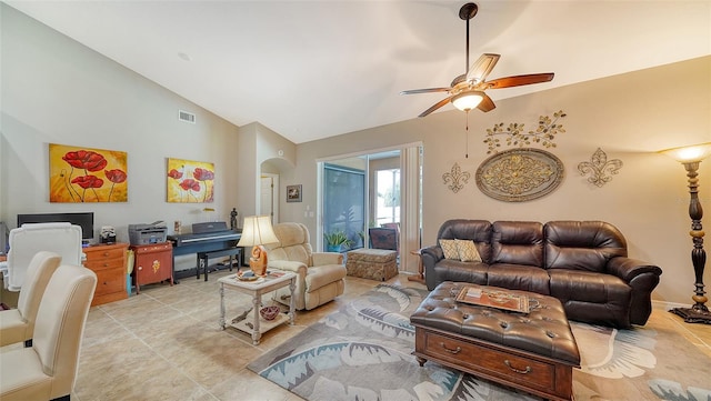 living room with ceiling fan, light tile patterned floors, and high vaulted ceiling