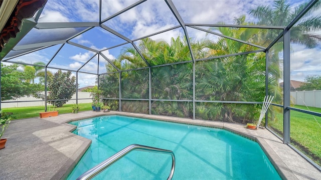 view of pool featuring a patio area and a lanai