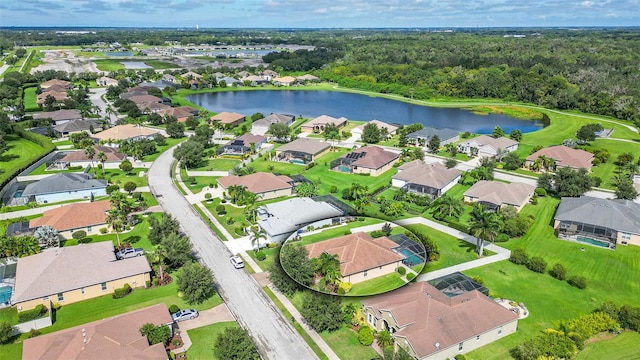 drone / aerial view with a water view