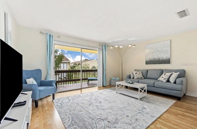 living room featuring light wood-type flooring