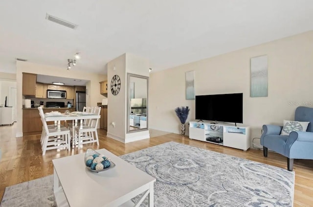 living room featuring light hardwood / wood-style floors