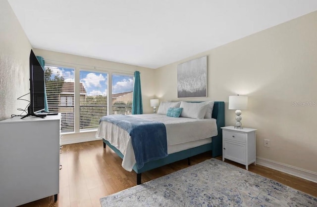 bedroom featuring light hardwood / wood-style flooring