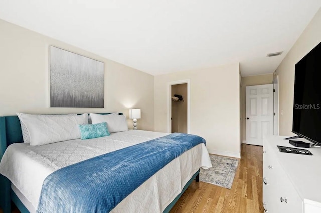 bedroom featuring light hardwood / wood-style flooring