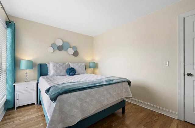 bedroom featuring hardwood / wood-style floors