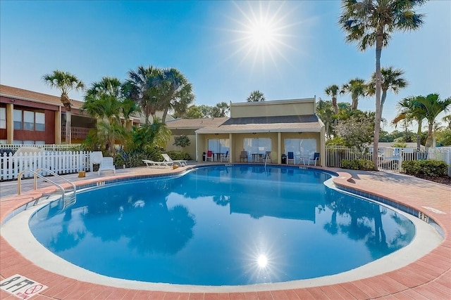 view of pool featuring a patio