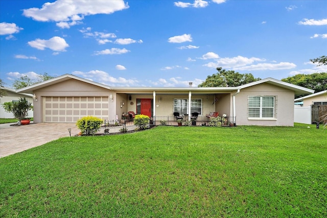 ranch-style house featuring a garage, a porch, and a front lawn