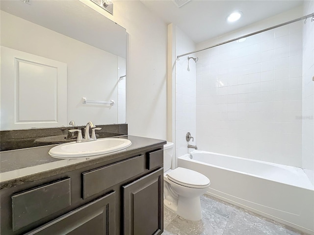 bathroom with shower / tub combination, toilet, and vanity
