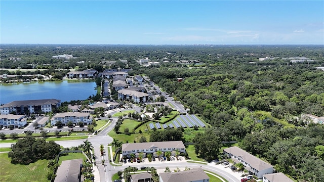 bird's eye view with a residential view and a water view