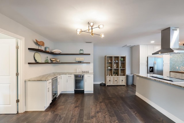 kitchen featuring wine cooler, dark hardwood / wood-style floors, stainless steel fridge with ice dispenser, island exhaust hood, and white cabinetry