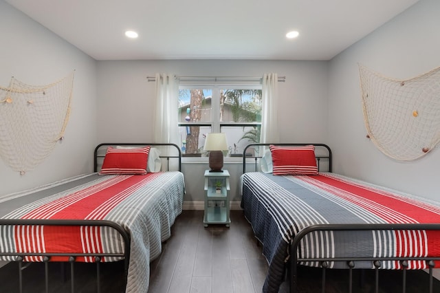 bedroom featuring dark wood-type flooring