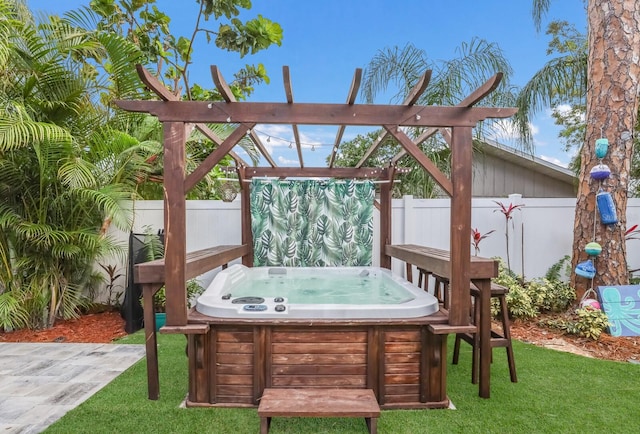 view of patio featuring a pergola and a hot tub