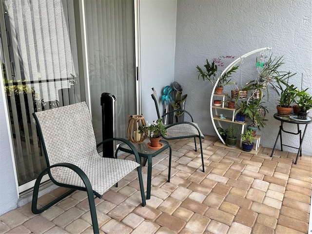 balcony featuring a patio area