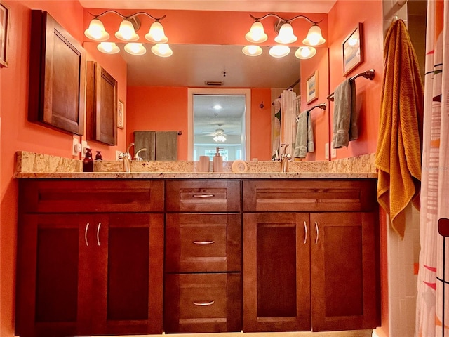 full bathroom featuring double vanity