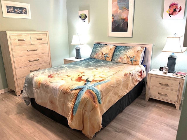 bedroom featuring light wood-type flooring