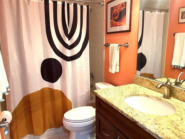 full bathroom with tile patterned floors, toilet, vanity, and a shower with curtain