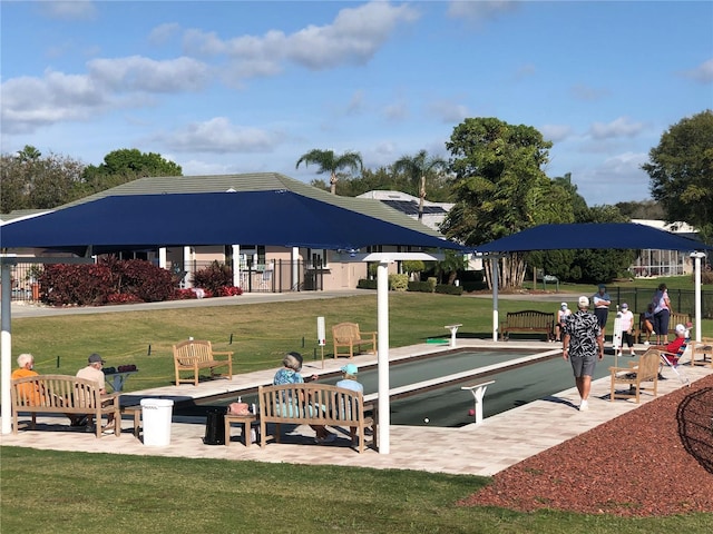 exterior space featuring a yard and fence