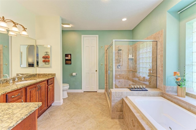 full bathroom featuring separate shower and tub, toilet, and vanity