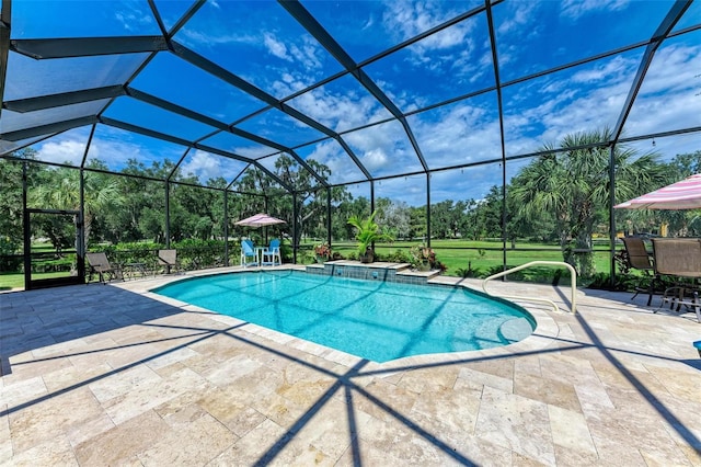 view of pool featuring glass enclosure and a patio