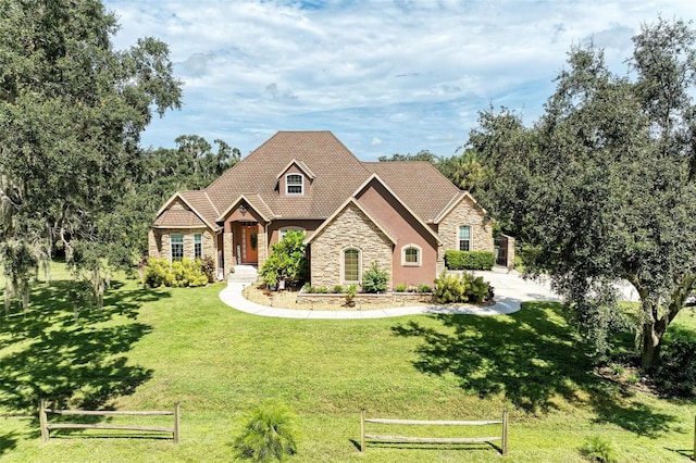 view of front of property with a front lawn