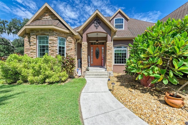 view of front of home with a front yard