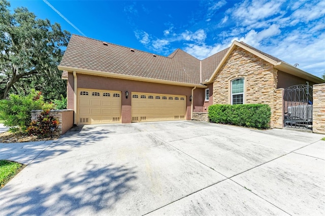 view of front of property featuring a garage