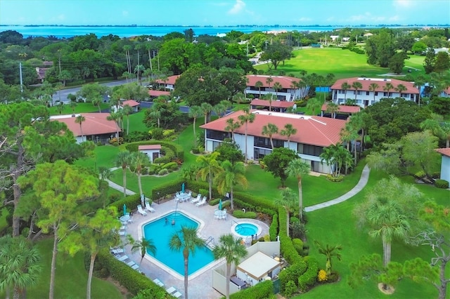 birds eye view of property featuring a water view