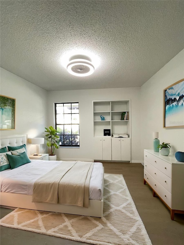 bedroom featuring a textured ceiling